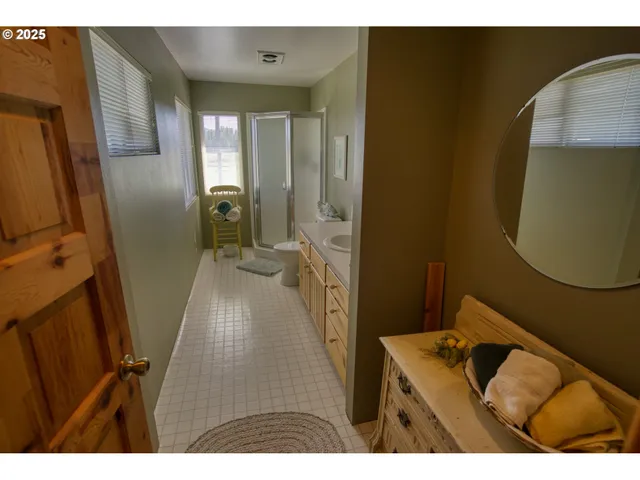 a view of a house with backyard and deck