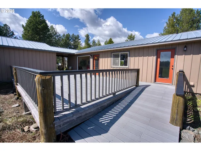 a view of balcony with wooden floor
