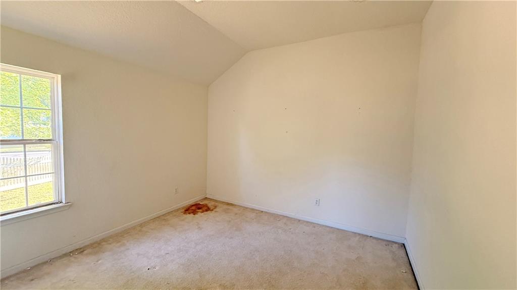 65 Lakeridge Court Covington, GA 30016 - Photo 15 of 17 an empty room with a window