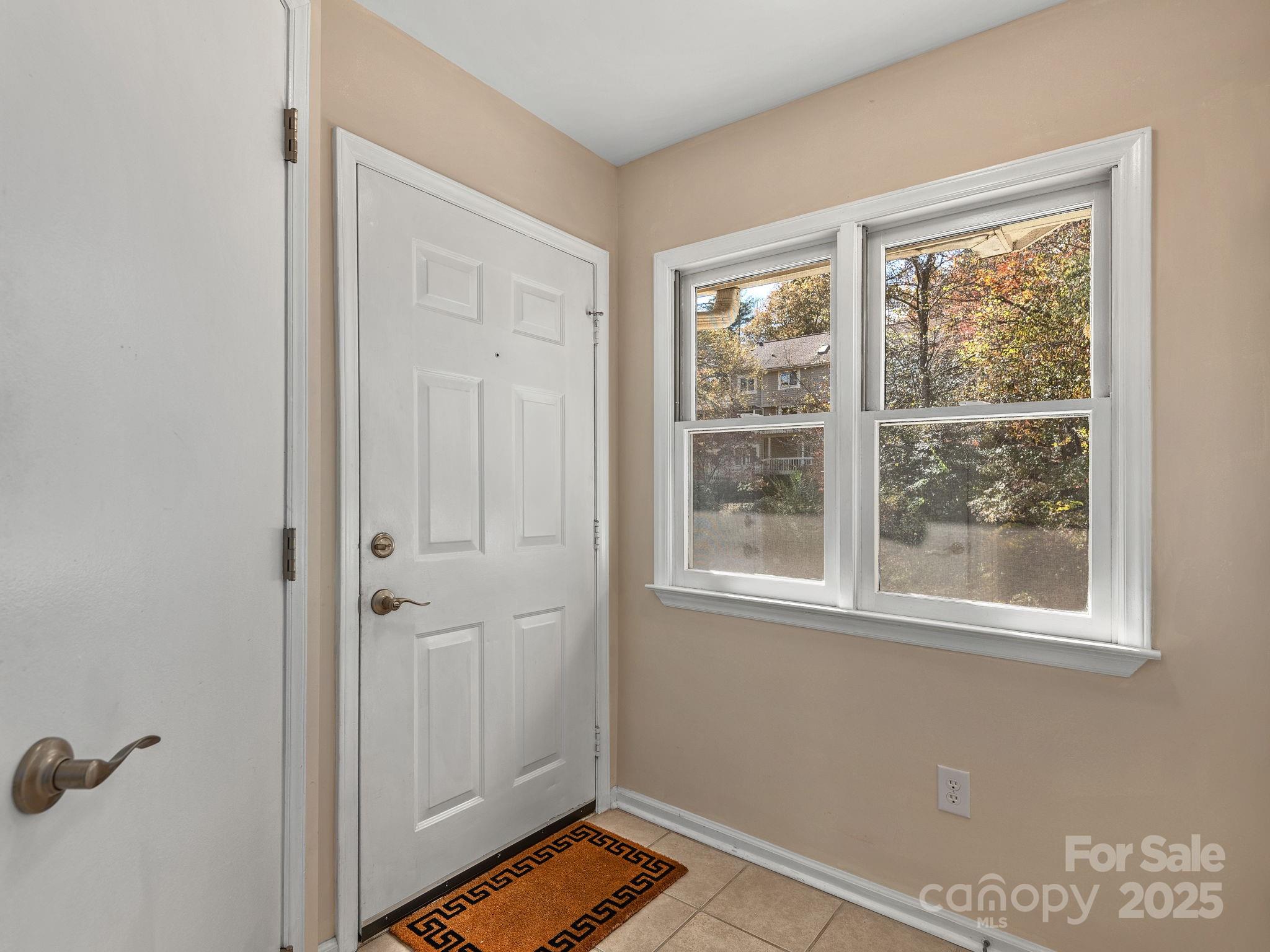8 Willow Tree Run, Unit 8 Asheville, NC 28803 - Photo 3 of 19 a view of an empty room with a window