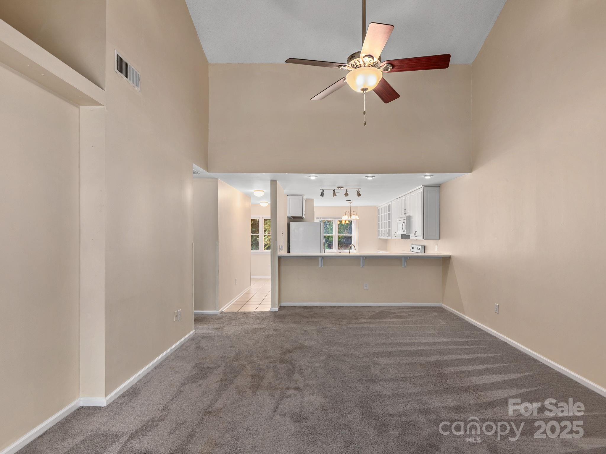 8 Willow Tree Run, Unit 8 Asheville, NC 28803 - Photo 5 of 19 a view interior of the house and a chandelier fan