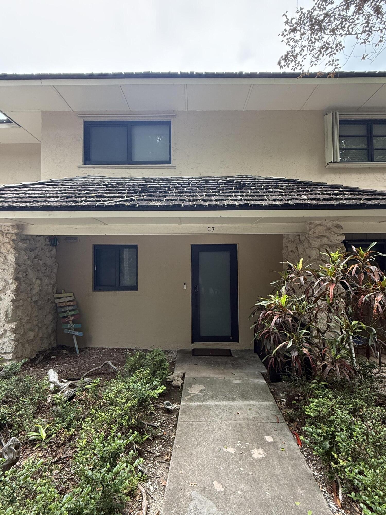 96000 Overseas Highway, Unit C7 Key Largo, FL 33037 - Photo 14 of 14 a front view of a house
