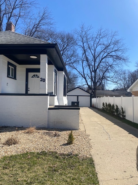 20 Central Avenue Aurora, IL 60506 - Photo 3 of 22 a front view of a house with a yard