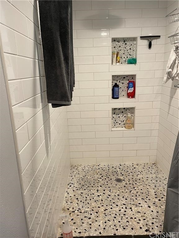 5259 Lewis Road Agoura Hills, CA 91301 - Photo 15 of 39 a bathroom with sinks and a mirror