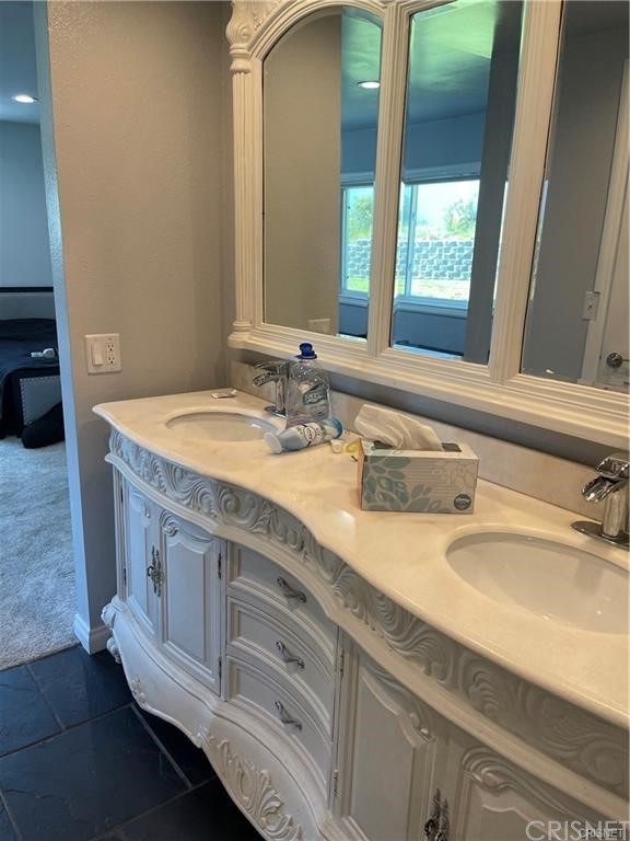 5259 Lewis Road Agoura Hills, CA 91301 - Photo 16 of 39 a living room with furniture and a flat screen tv