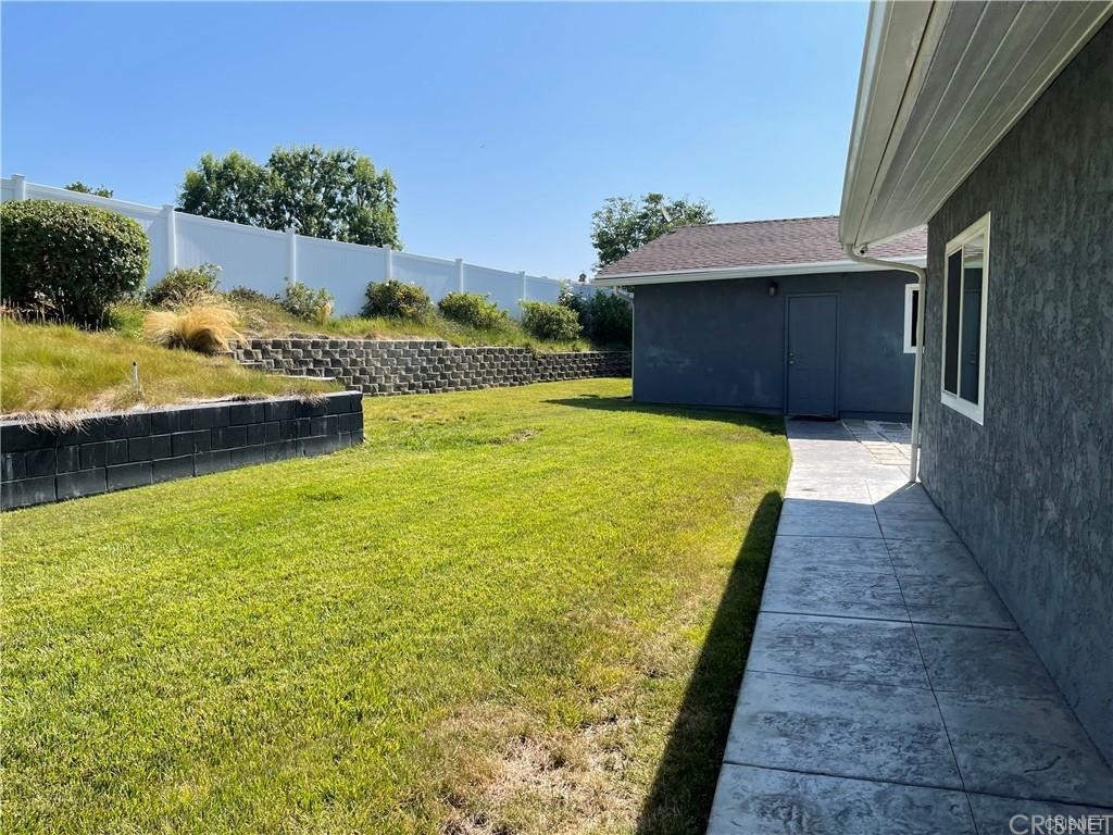 5259 Lewis Road Agoura Hills, CA 91301 - Photo 4 of 39 a view of a patio with table and chairs