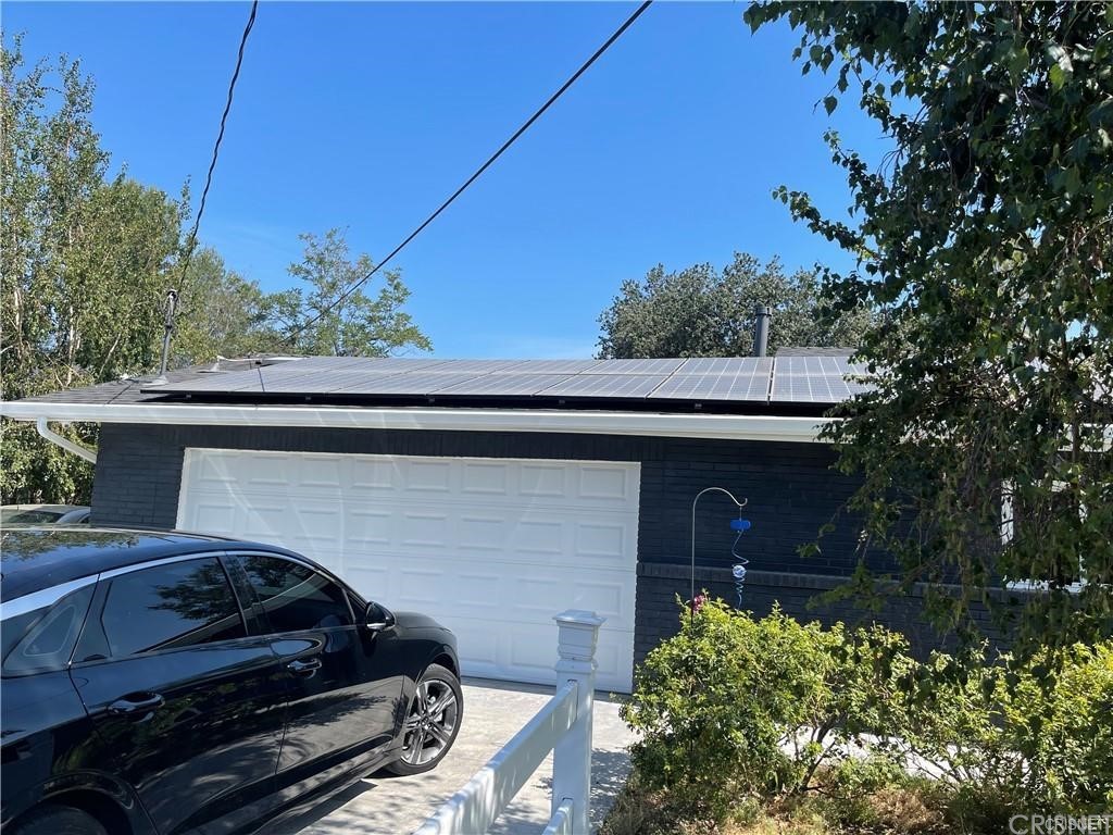 5259 Lewis Road Agoura Hills, CA 91301 - Photo 38 of 39 a front view of a house with garden
