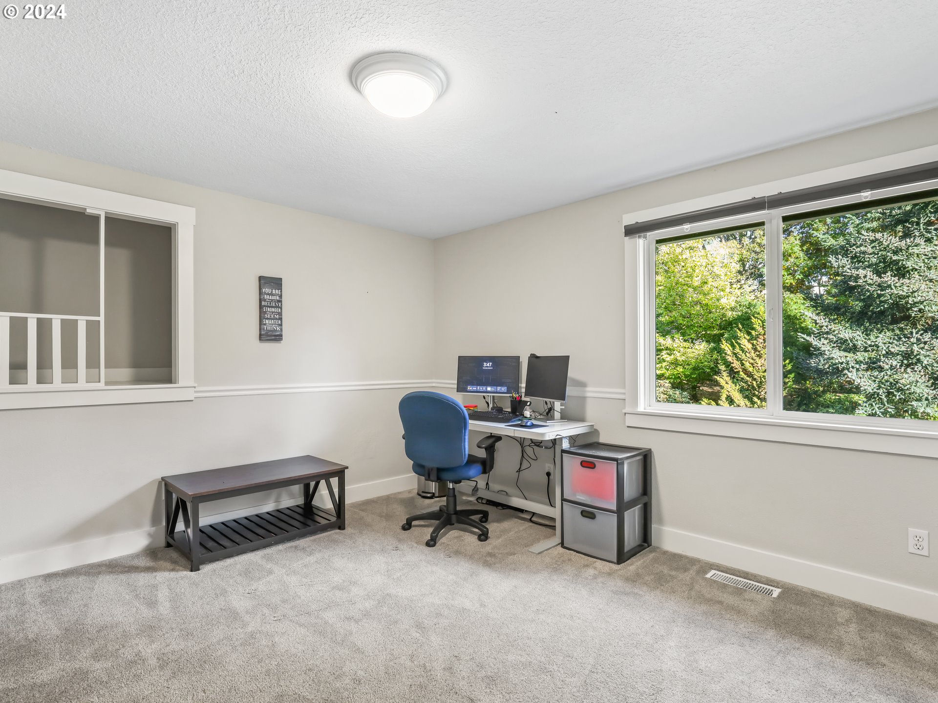 16787 Southeast Tong Road Damascus, OR 97089 - Photo 24 of 47 a view of a workspace with furniture and a window