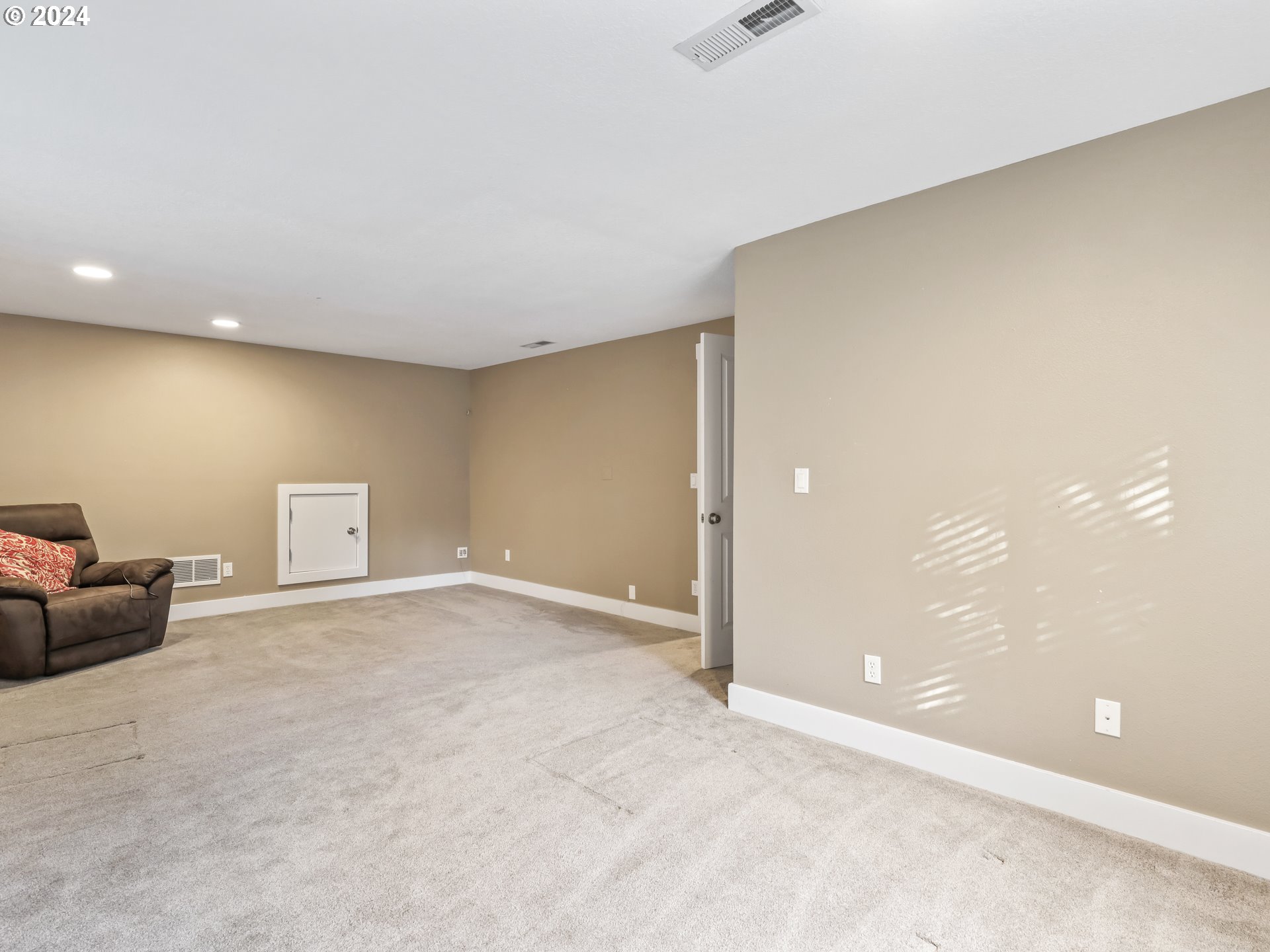 16787 Southeast Tong Road Damascus, OR 97089 - Photo 30 of 47 a view of an empty room with wooden floor