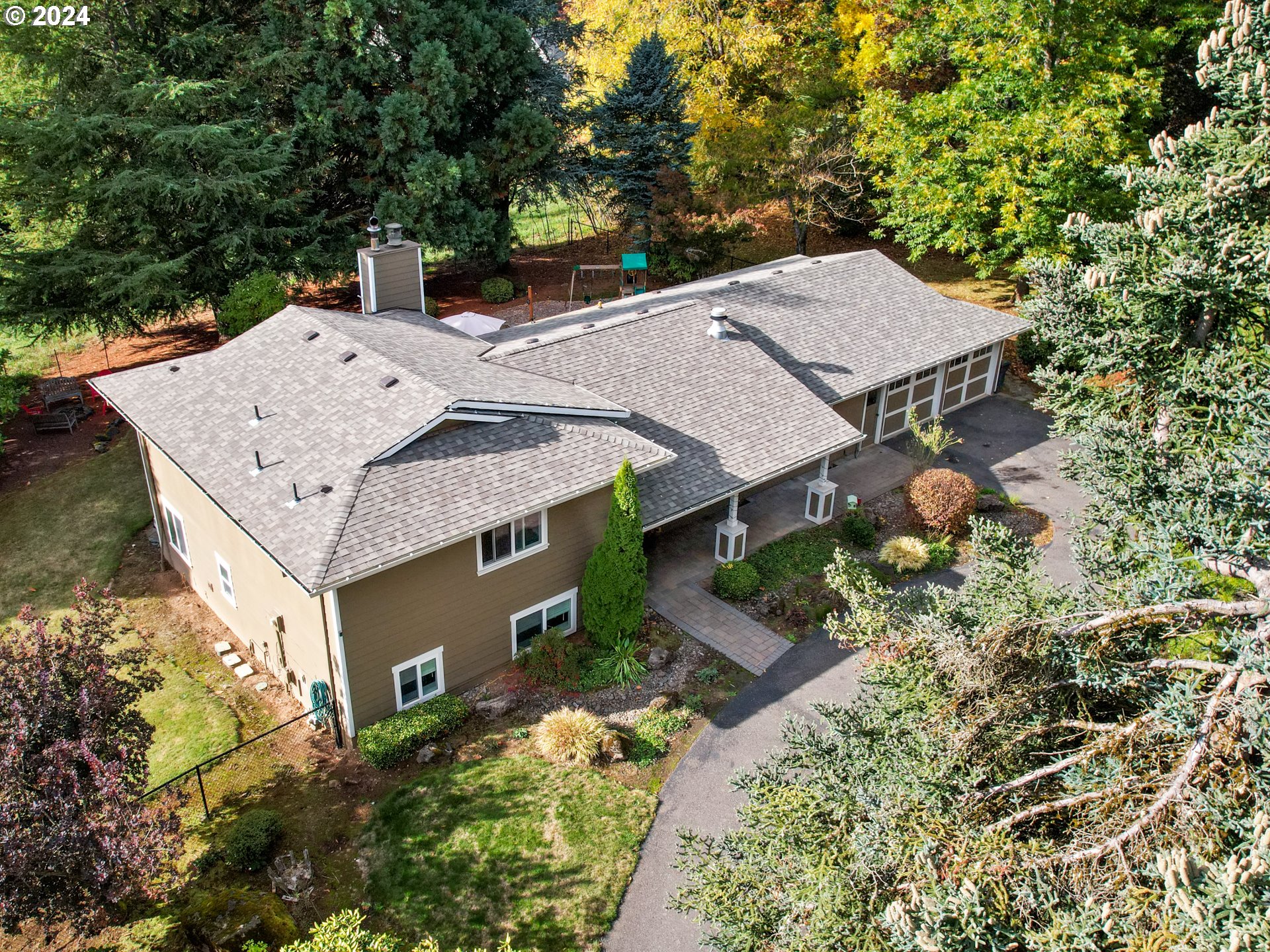 16787 Southeast Tong Road Damascus, OR 97089 - Photo 3 of 47 an aerial view of a house with a yard