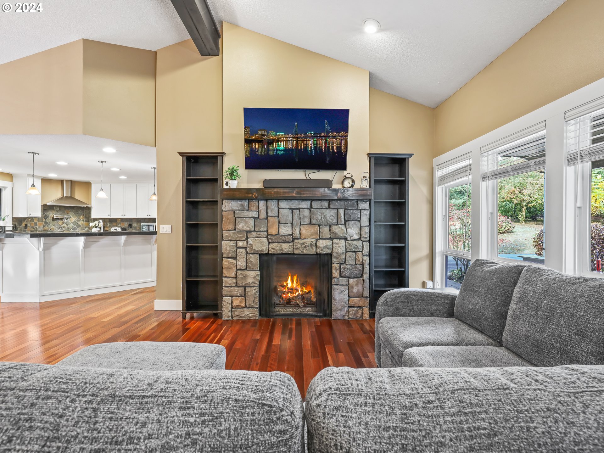 16787 Southeast Tong Road Damascus, OR 97089 - Photo 7 of 47 a living room with furniture and a fireplace