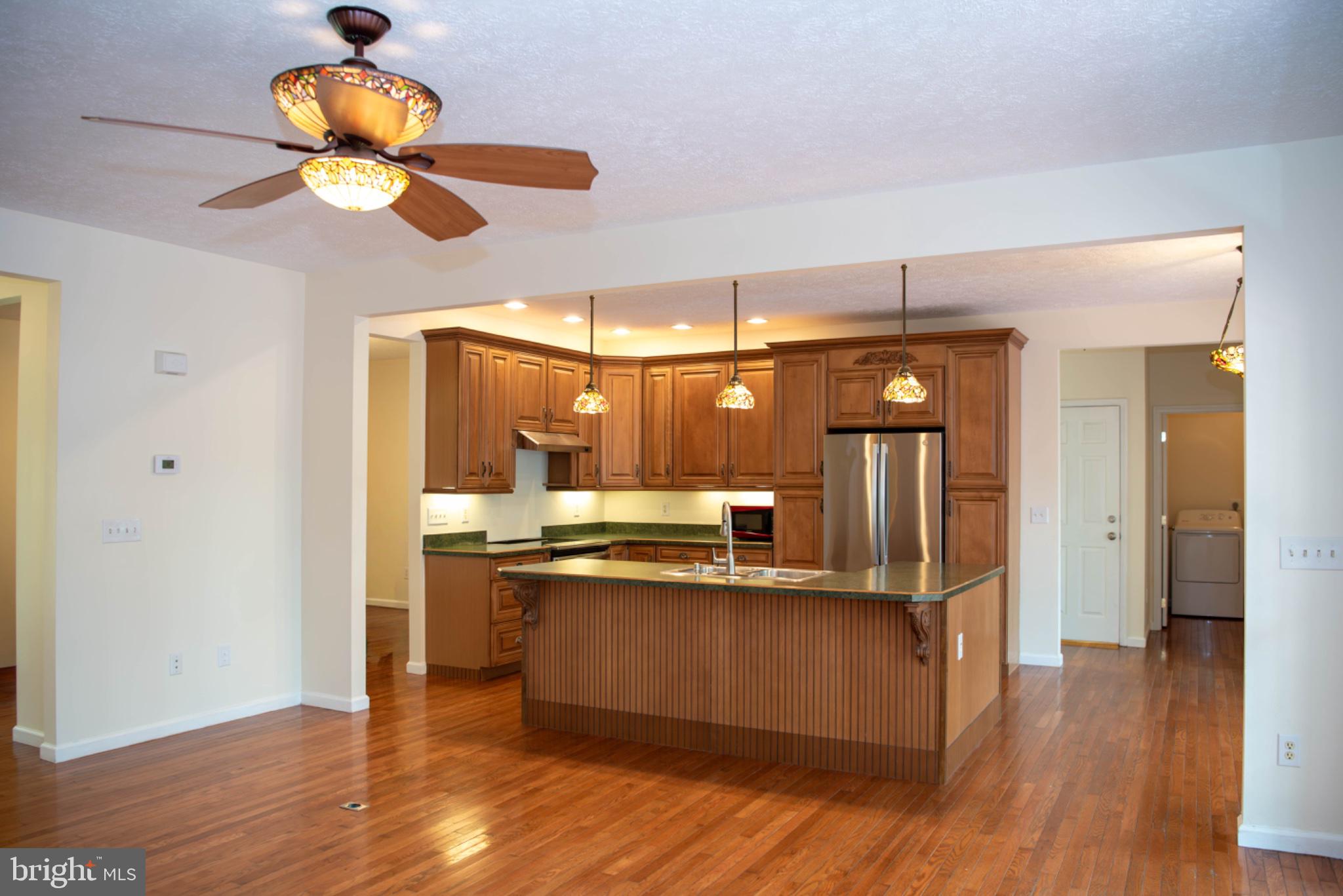 792 Forest Glen Road Moorefield, WV 26836 - Photo 36 of 146 Inviting kitchen with warm wood tones.
