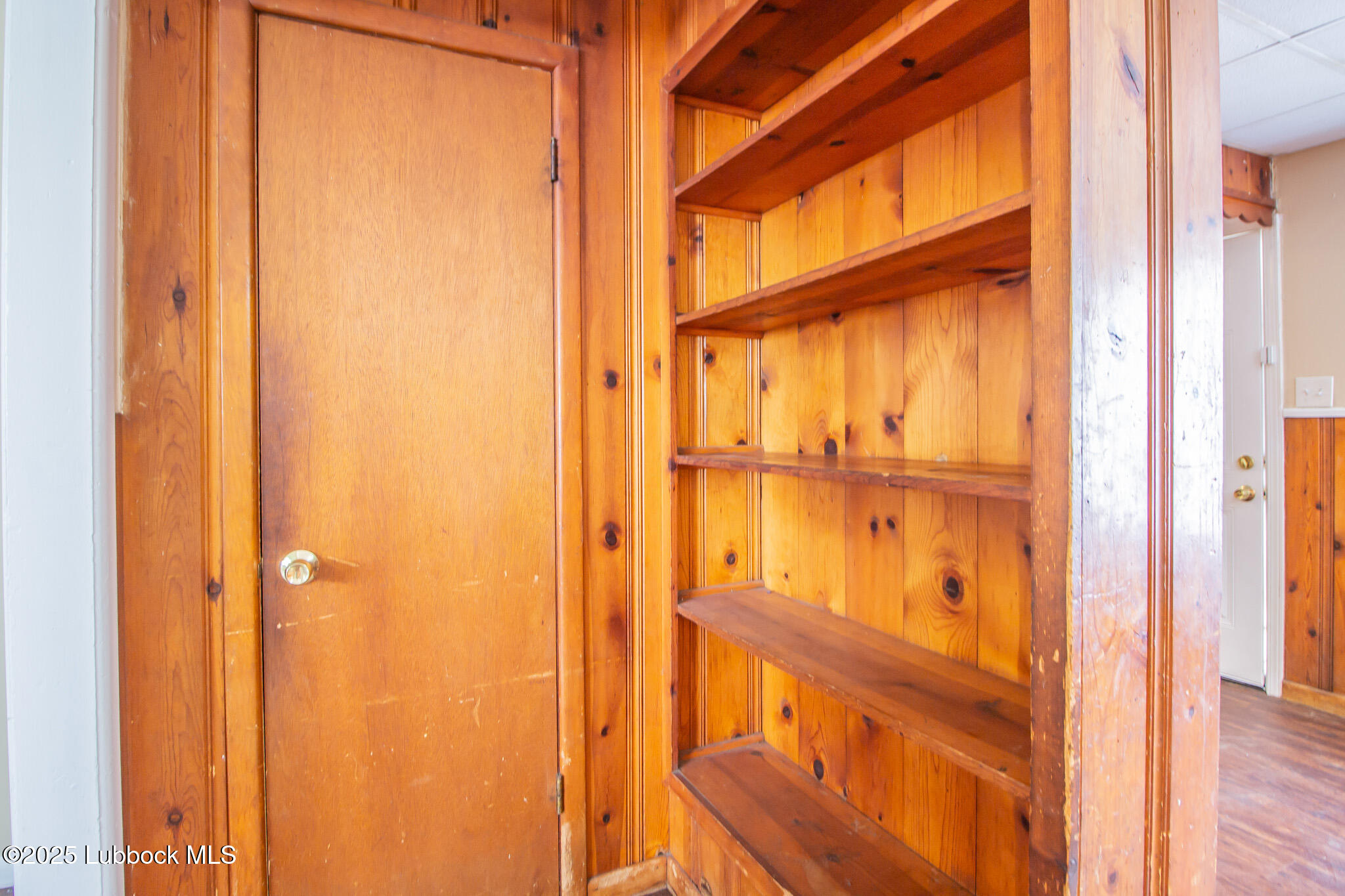 2414 38th Street Lubbock, TX 79412 - Photo 6 of 20 a view of walk in closet with large window