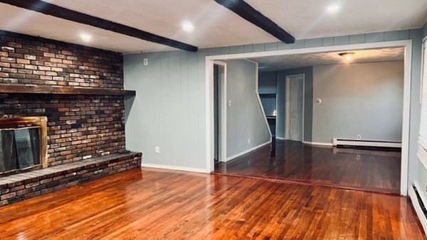 34 Border Street Springfield, MA 01104 - Photo 13 of 20 a view of a livingroom with wooden floor