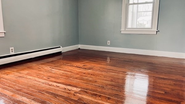 34 Border Street Springfield, MA 01104 - Photo 18 of 20 a view of a room with wooden floor and cabinet