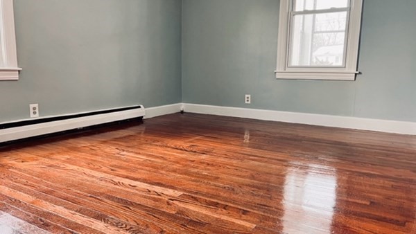 34 Border Street Springfield, MA 01104 - Photo 19 of 20 a view of empty room with wooden floor and fan