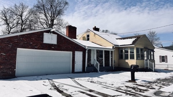34 Border Street Springfield, MA 01104 - Photo 2 of 20 a front view of a house with a yard