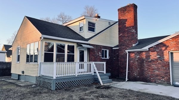 34 Border Street Springfield, MA 01104 - Photo 3 of 20 a view of a house with a yard
