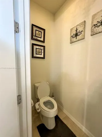 a bathroom with a toilet and a sink