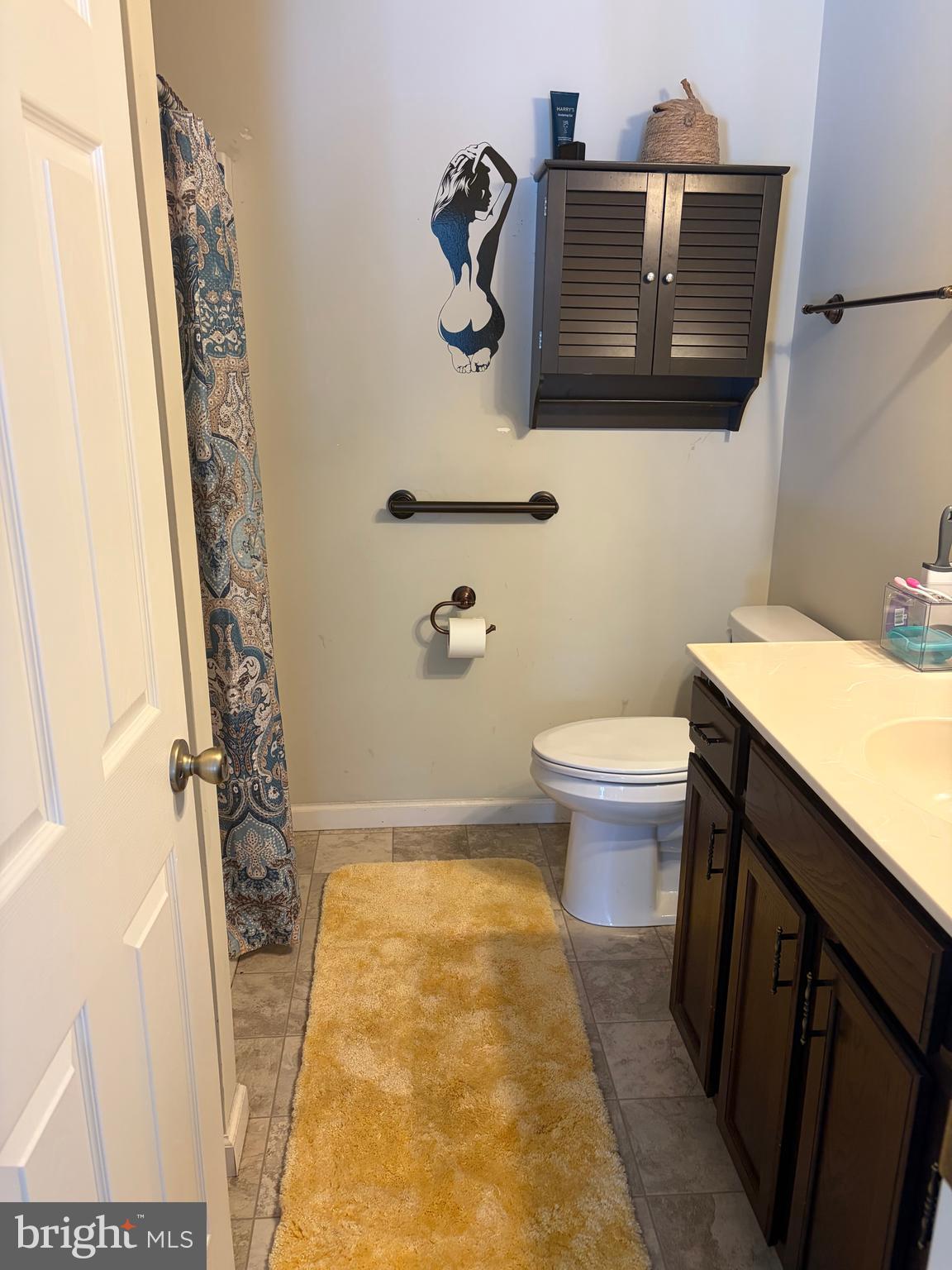 74 Emily Court Reading, PA 19606 - Photo 21 of 31 a bathroom with a granite countertop sink and a toilet