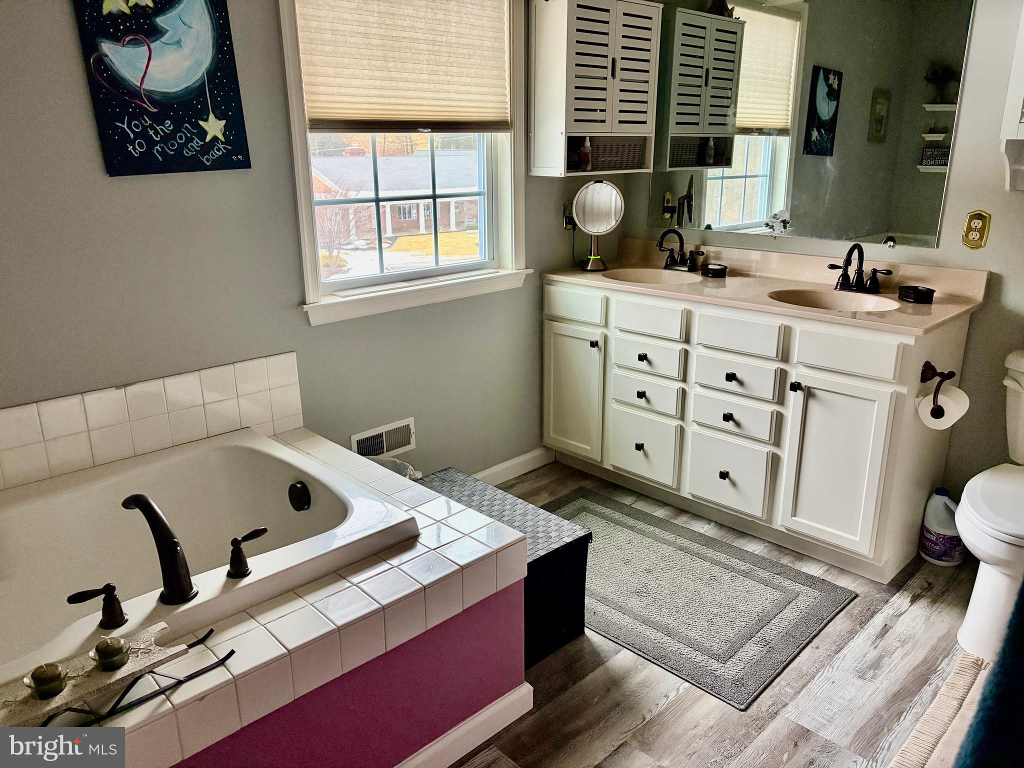 74 Emily Court Reading, PA 19606 - Photo 23 of 31 a bathroom with a sink a toilet and a window