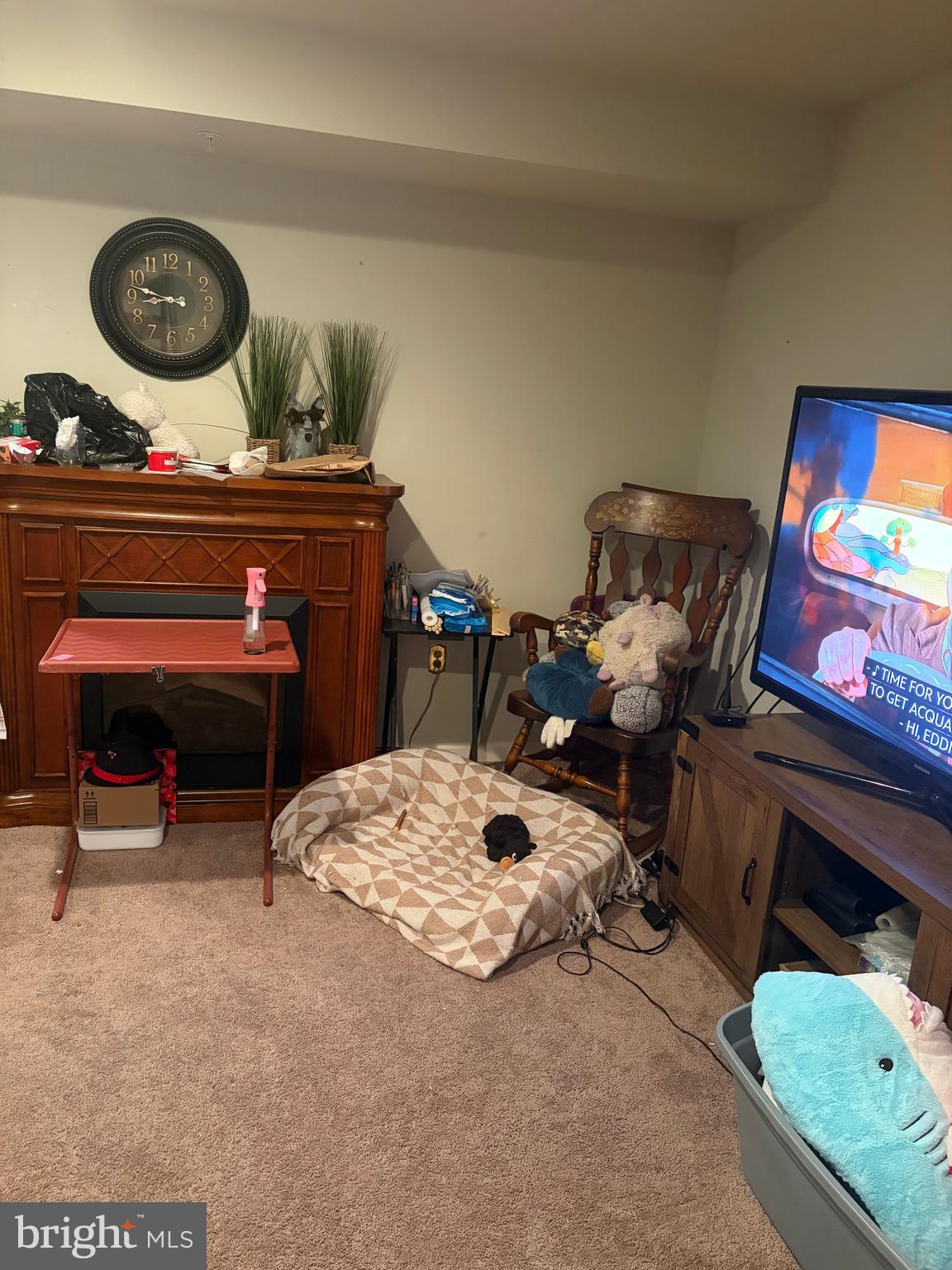74 Emily Court Reading, PA 19606 - Photo 5 of 31 a living room with furniture and a chair