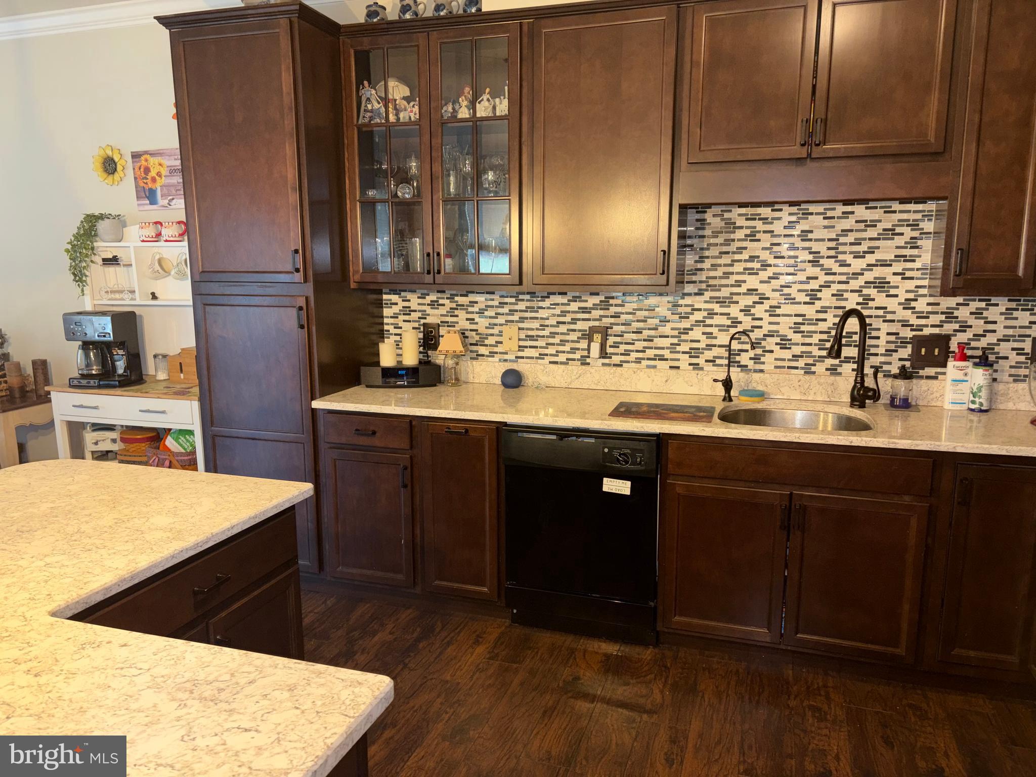 74 Emily Court Reading, PA 19606 - Photo 8 of 31 a kitchen with stainless steel appliances wooden cabinets and a sink