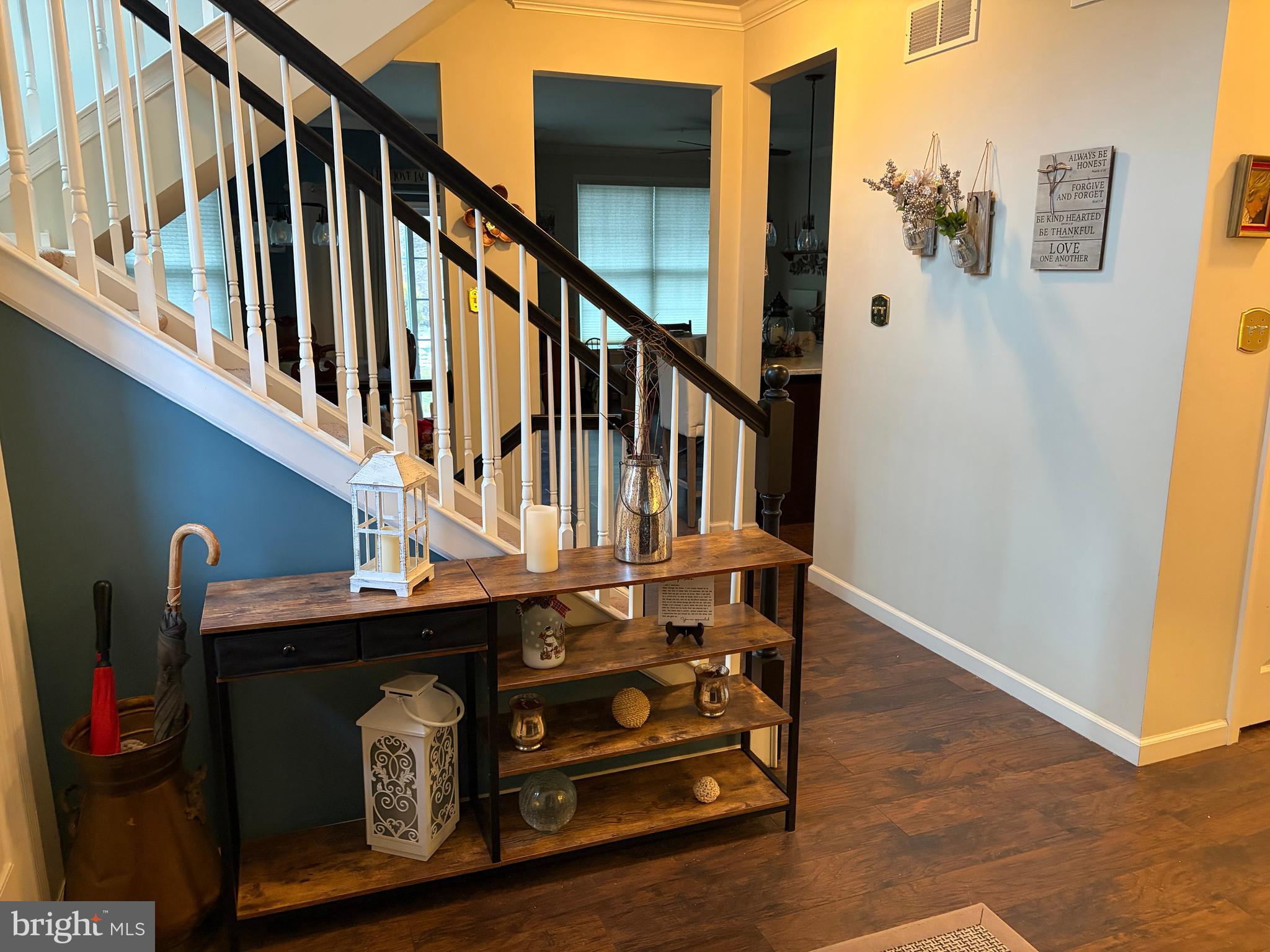 74 Emily Court Reading, PA 19606 - Photo 9 of 31 a utility room with wooden floor and stairs