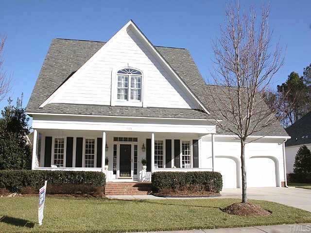 7628 Wilderness Road Raleigh, NC 27613 - Photo 1 of 1 a view of a house with a yard and couches
