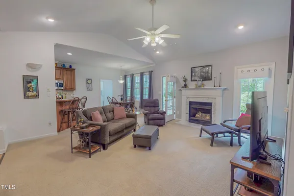 a view of a patio with a table and chairs