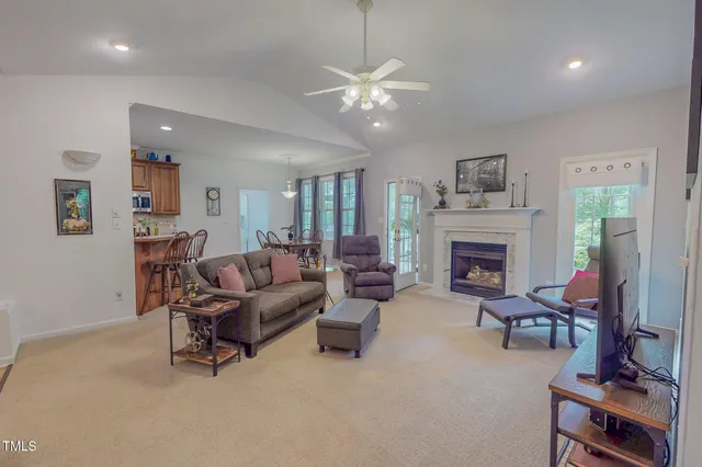 a view of a patio with a table and chairs