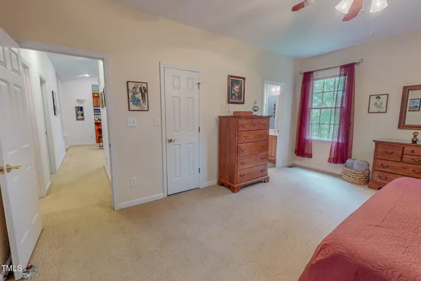 a spacious bathroom with a double vanity sink