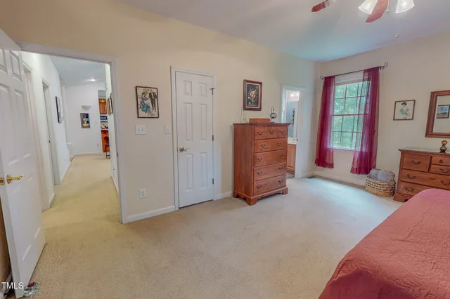 a spacious bathroom with a double vanity sink