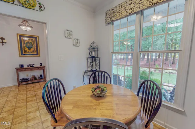 a room with furniture and wooden floor