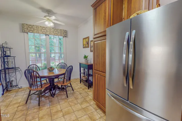 a view of a bathroom with a sink and mirror