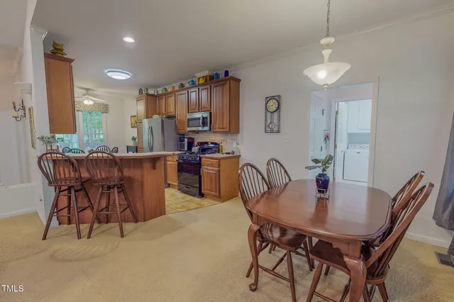 a view of a dining room with furniture