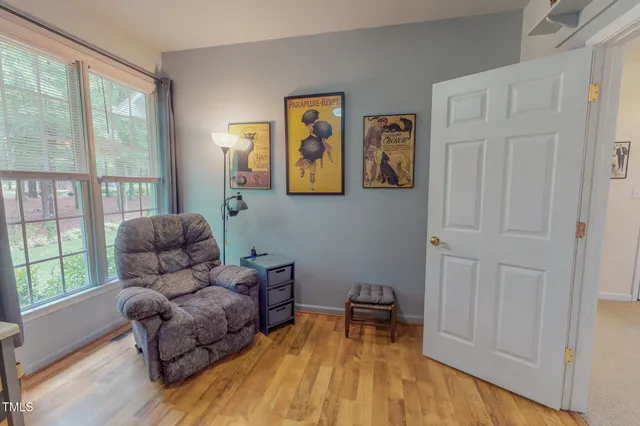 a view of a house with pool and garden