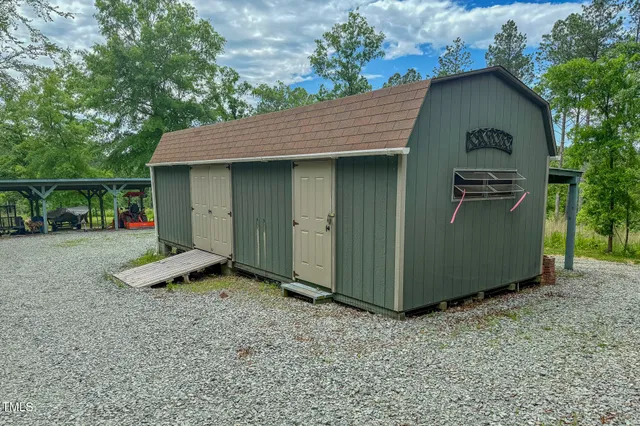 a view of a garden with a fountain