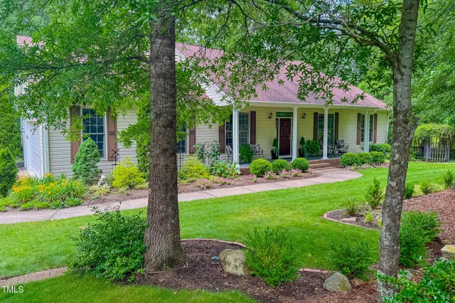 a kitchen with stainless steel appliances granite countertop a stove a sink dishwasher and cabinets