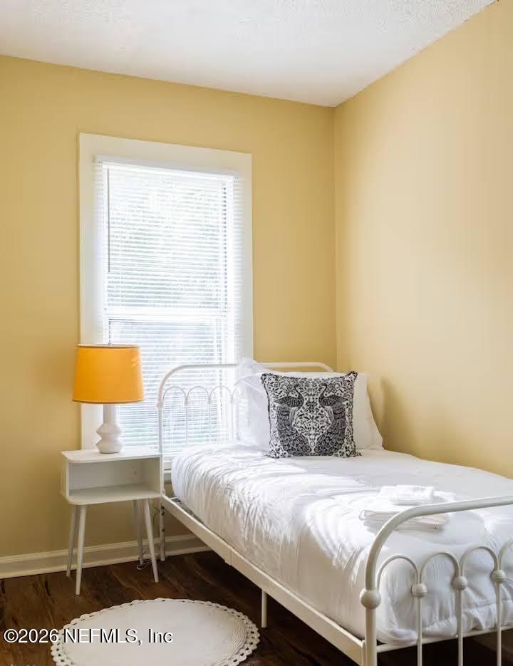 1438 Dancy Street Jacksonville, FL 32205 - Photo 18 of 49 a bedroom with a bed and a cabinets