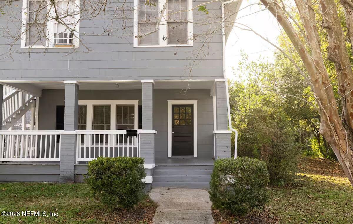 1438 Dancy Street Jacksonville, FL 32205 - Photo 2 of 49 a view of a house with a small yard and wooden floor and fence