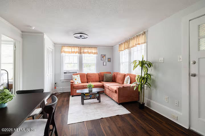 1438 Dancy Street Jacksonville, FL 32205 - Photo 35 of 49 a living room with furniture and a window