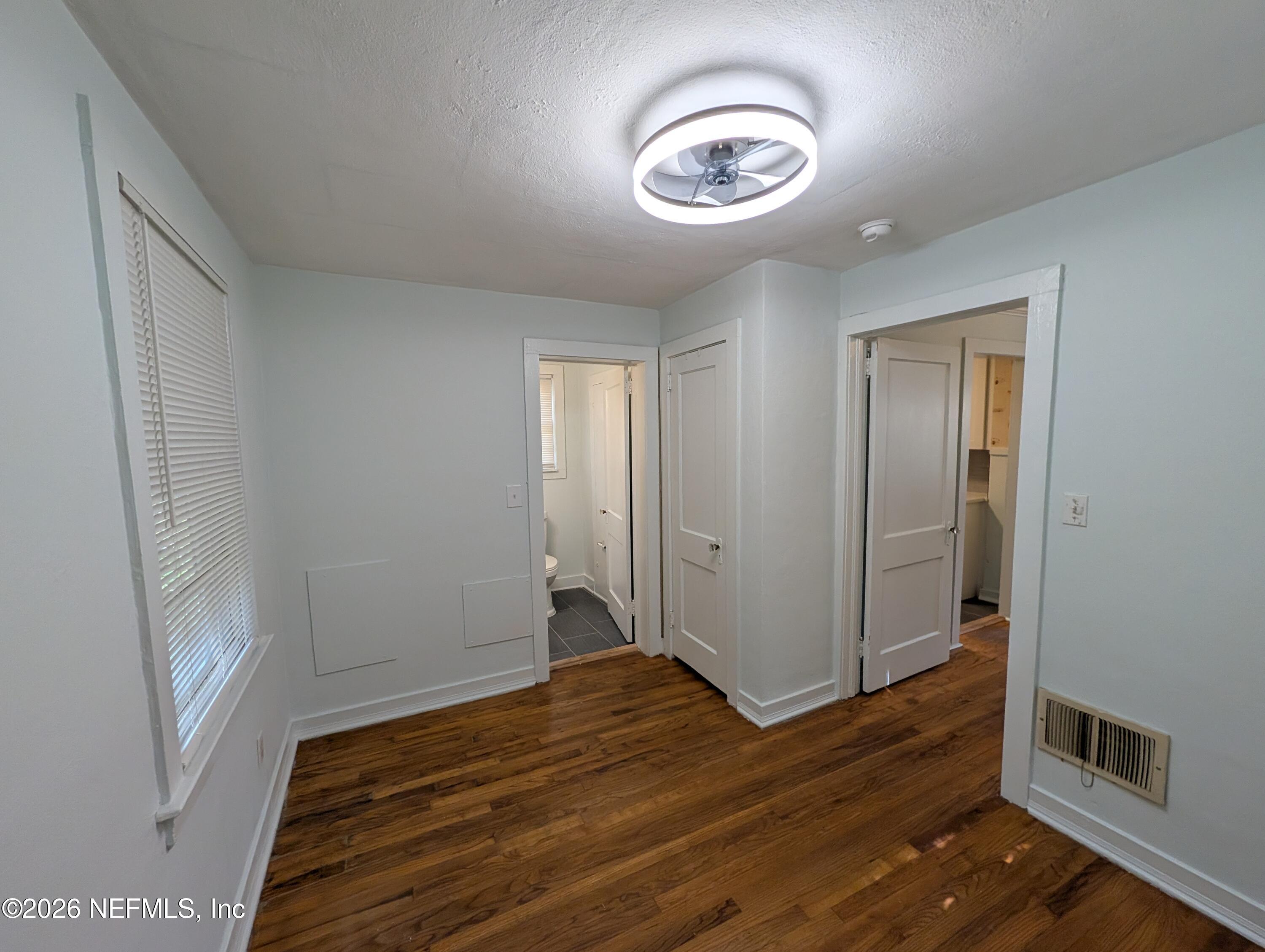 1438 Dancy Street Jacksonville, FL 32205 - Photo 48 of 49 a view of a livingroom with wooden floor