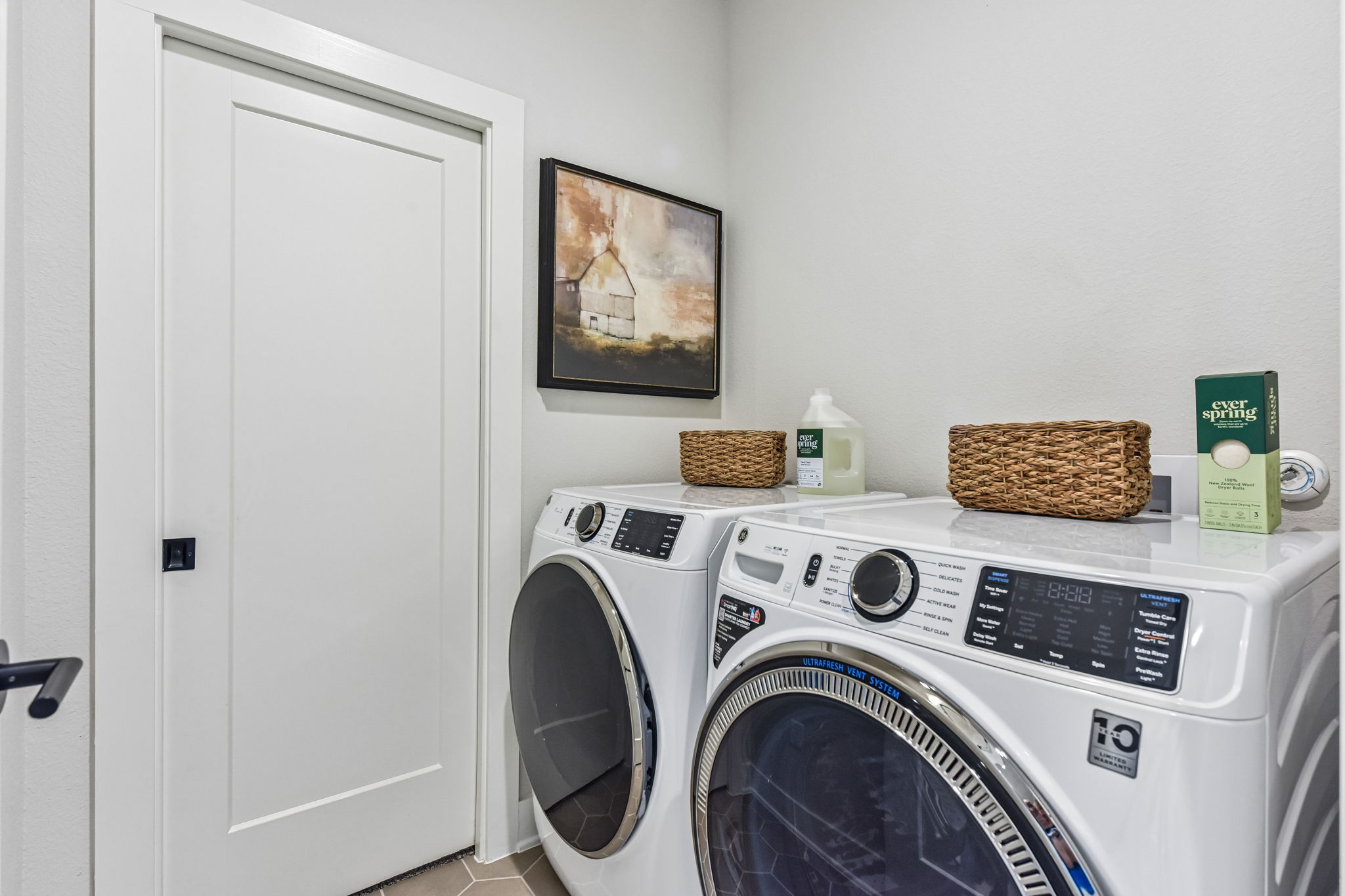 9033 Cattle Baron Path Austin, TX 78747 - Photo 23 of 40 Streamlined laundry area with modern appliances for effortless household chores.