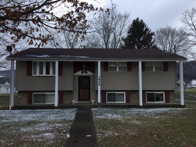 3848 Maple Street Hawthorn, PA 16230 - Photo 1 of 1 a house that has a tree in front of it