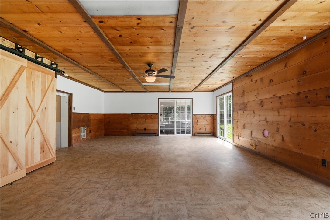 305 Howard Road Volney, NY 13069 - Photo 32 of 49 Great room leading to screened in porch