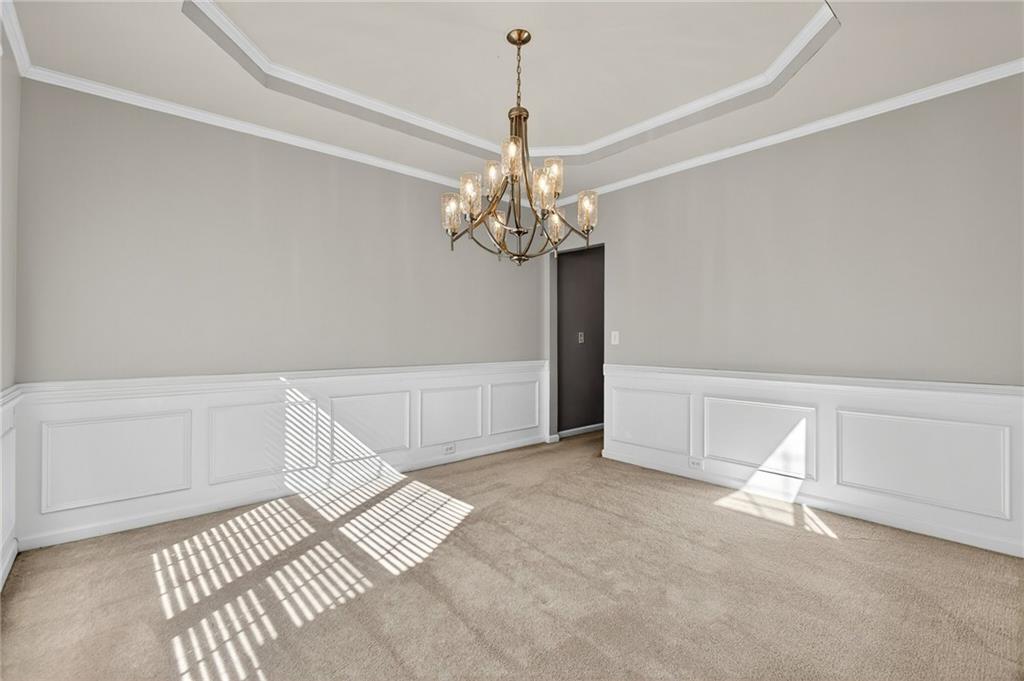 103 Forest Creek Way Canton, GA 30115 - Photo 11 of 55 a view of a chandelier in a room