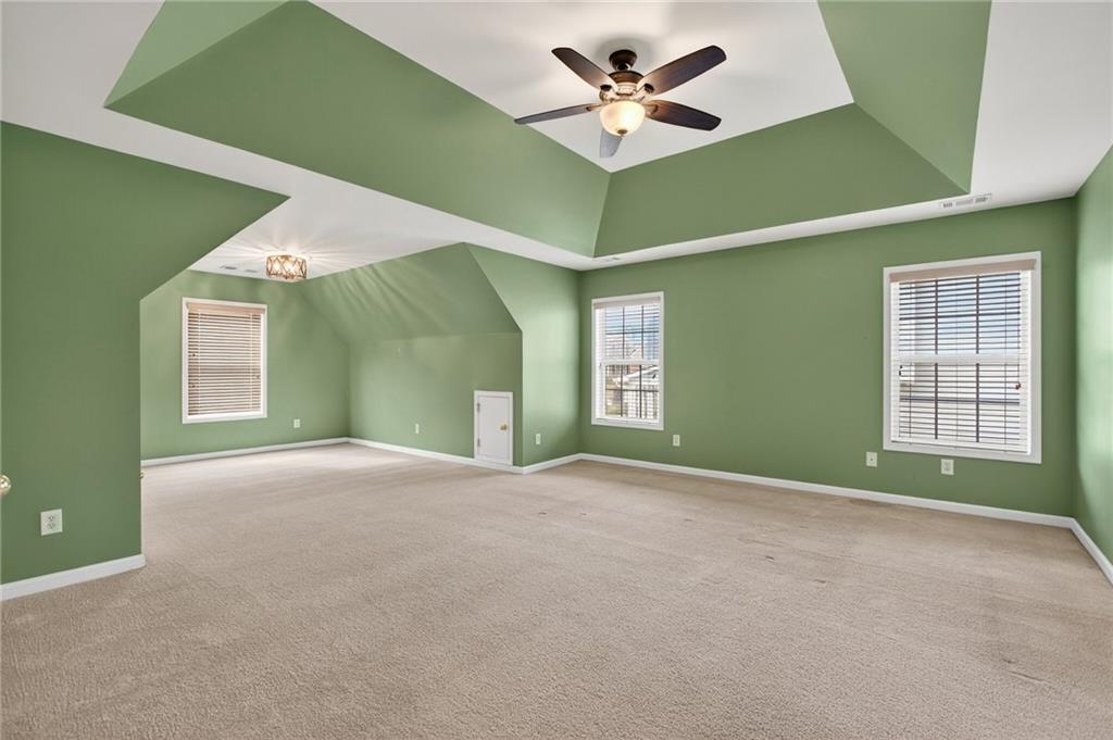 103 Forest Creek Way Canton, GA 30115 - Photo 30 of 55 a view of an empty room with window and a fan