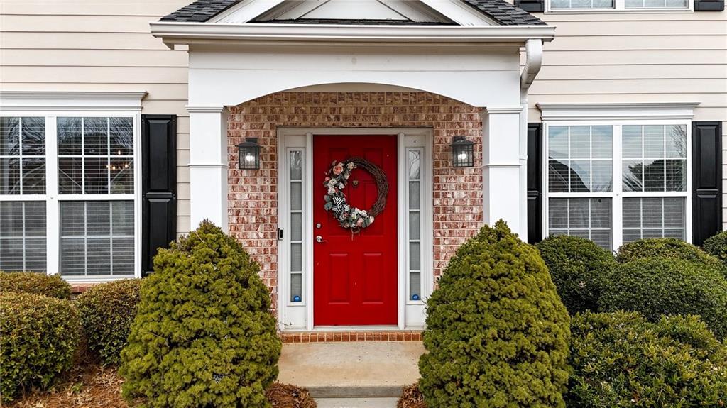 103 Forest Creek Way Canton, GA 30115 - Photo 5 of 55 a front view of a house with a yard