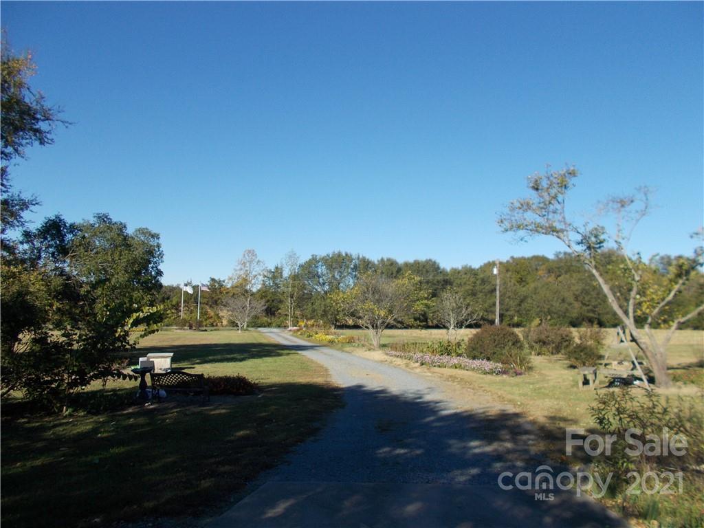 109 Brief Road West Fairview, NC 28079 - Photo 13 of 16 a view of mountain with beach and green space
